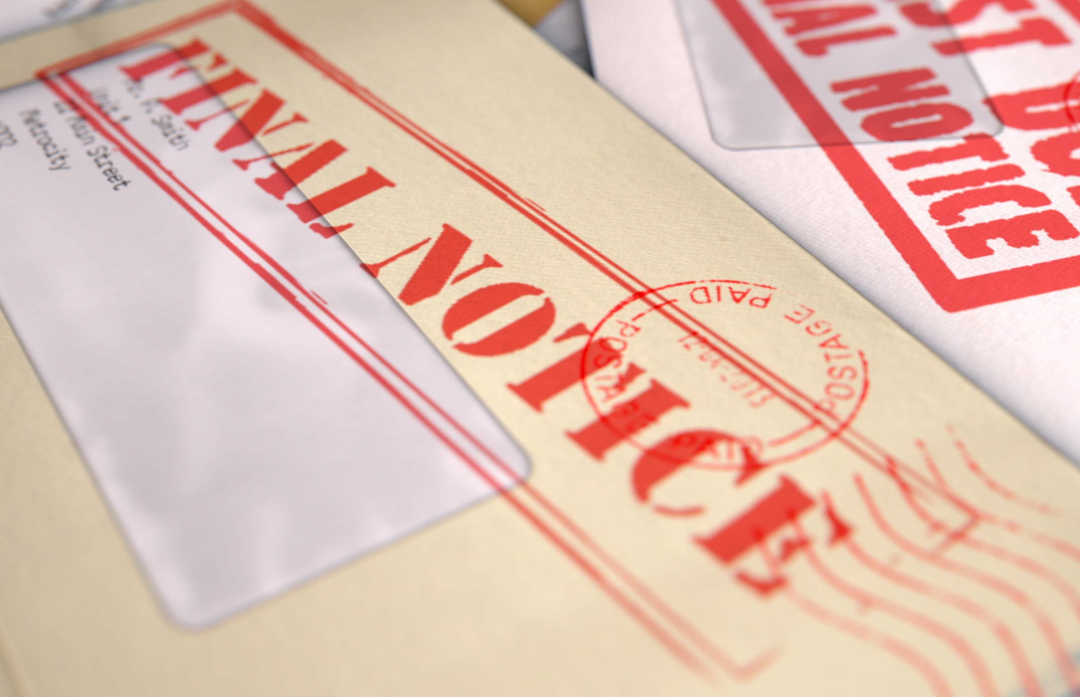 Close-up of a letter with &quot;FINAL NOTICE&quot; stamped in bold, indicating urgency or an overdue matter