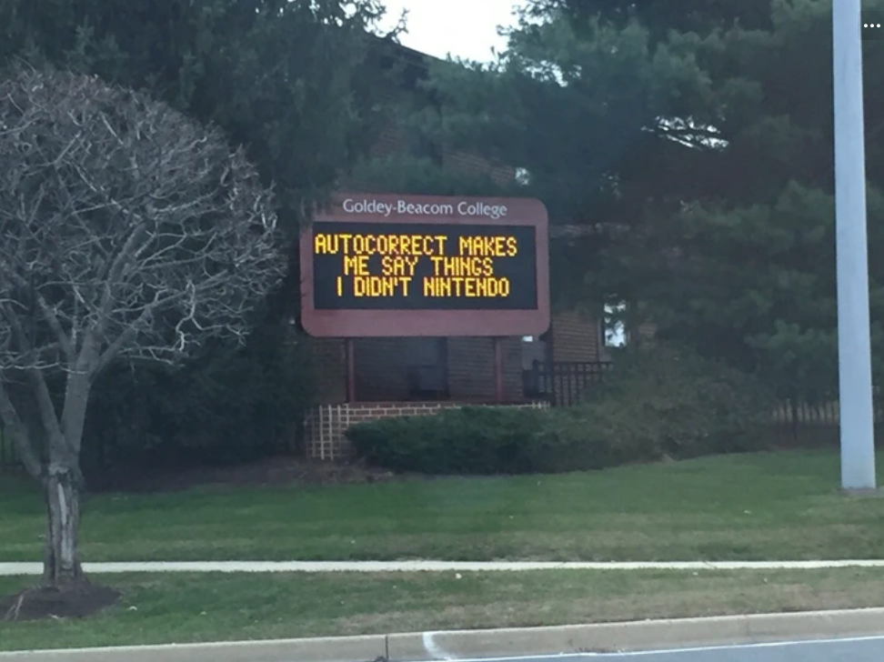 College sign reads: "Autocorrect makes me say things I didn't Nintendo"