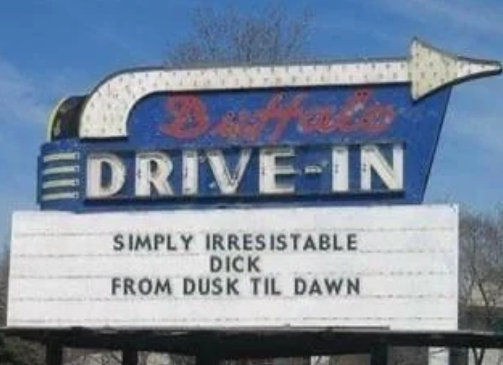 A drive-in theater sign displaying film titles: "Simply Irresistible," "Dick," "From Dusk Till Dawn." However, it appears to read "simply irresistible dick from dusk til dawn"