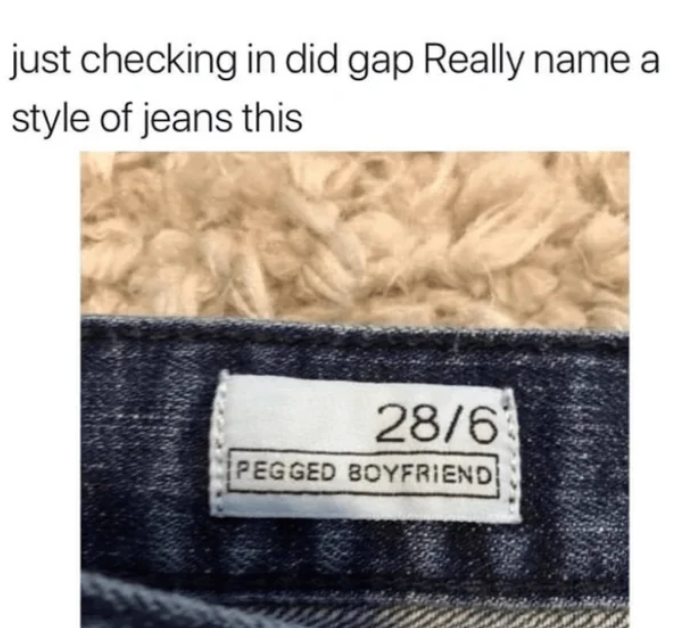 Clothing label with text "28/6 Pegged Boyfriend" and caption questioning Gap's naming choice for a jeans style
