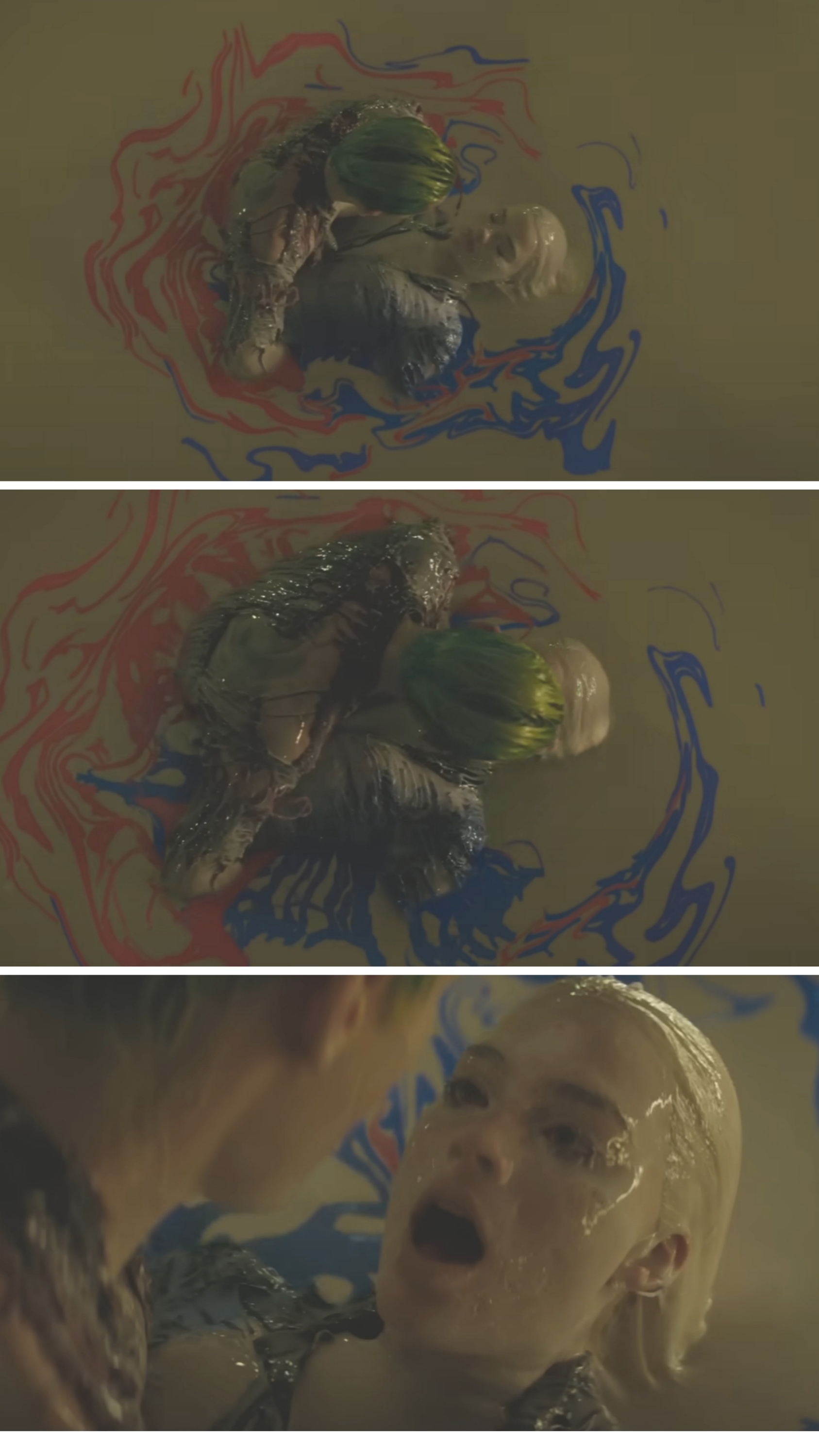 in the vat of goo, Joker holds Harley Quinn and kisses her