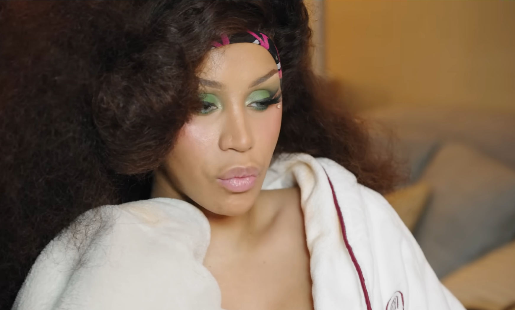 Cardi B in glam makeup and hair preparing for the Met Gala