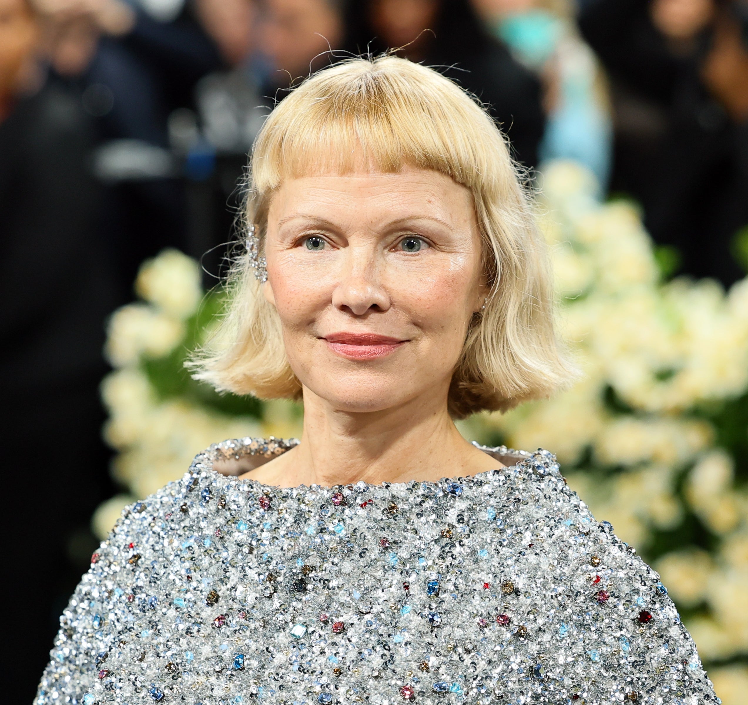 Pamela Anderson on a formal event's red carpet