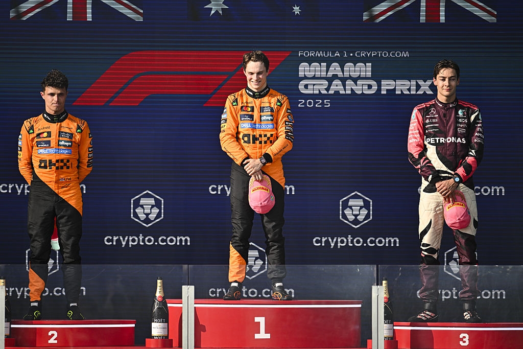 Formula 1 Miami Grand Prix 2025 winners on the podium, holding trophies