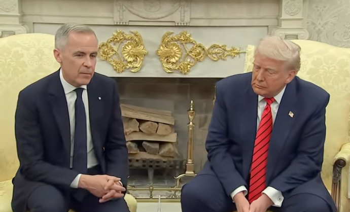 Two men sitting on beige chairs in a formal room, engaged in conversation