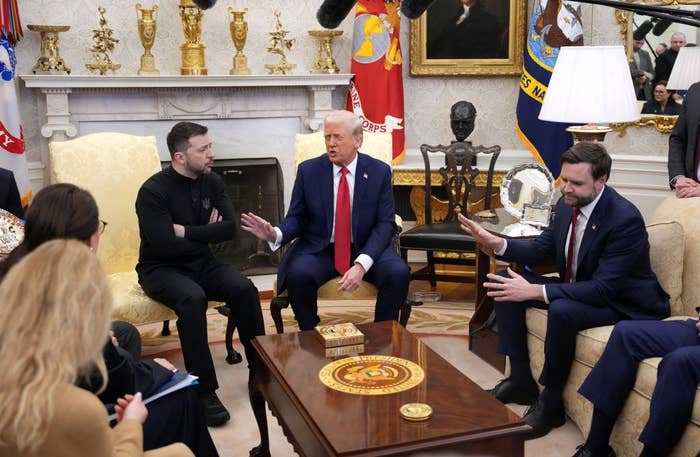 People successful a ceremonial gathering with ornate decor, engaged successful discussion