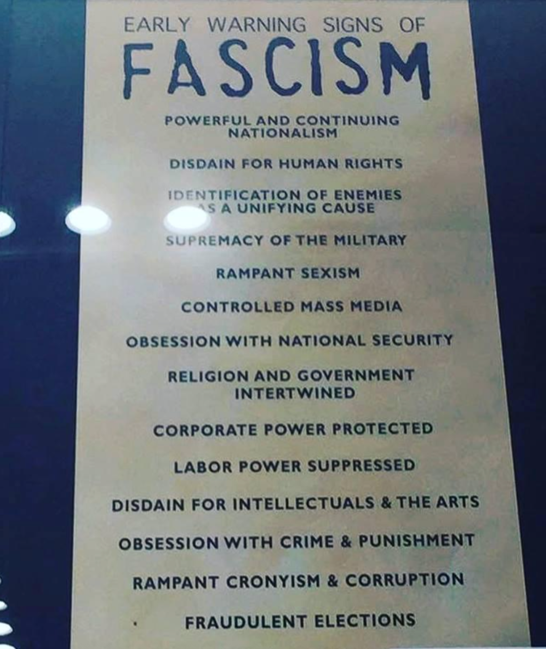 A list titled "Early Warning Signs of Fascism" includes points like nationalism, disdain for human rights, military supremacy, and fraudulent elections