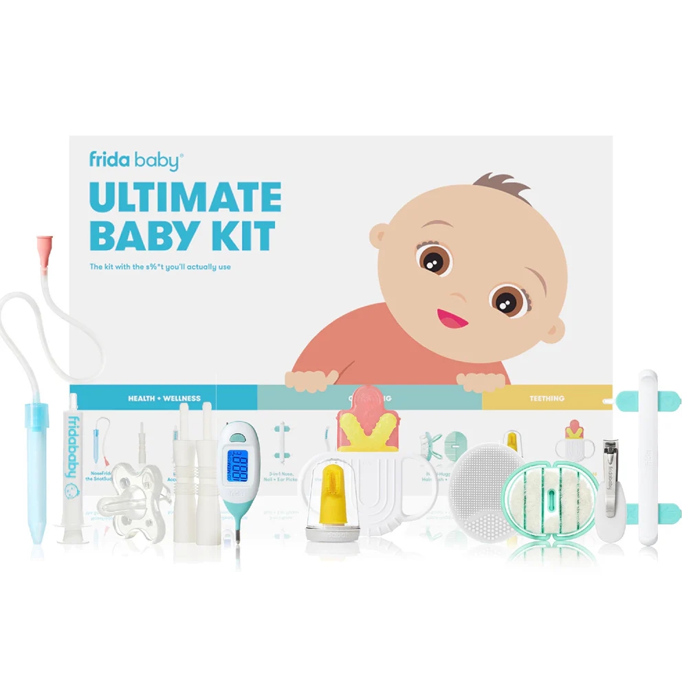 Frida Baby Ultimate Baby Kit with various baby care products such as nasal aspirator, medicine dispenser, and pacifier, displayed in front of packaging