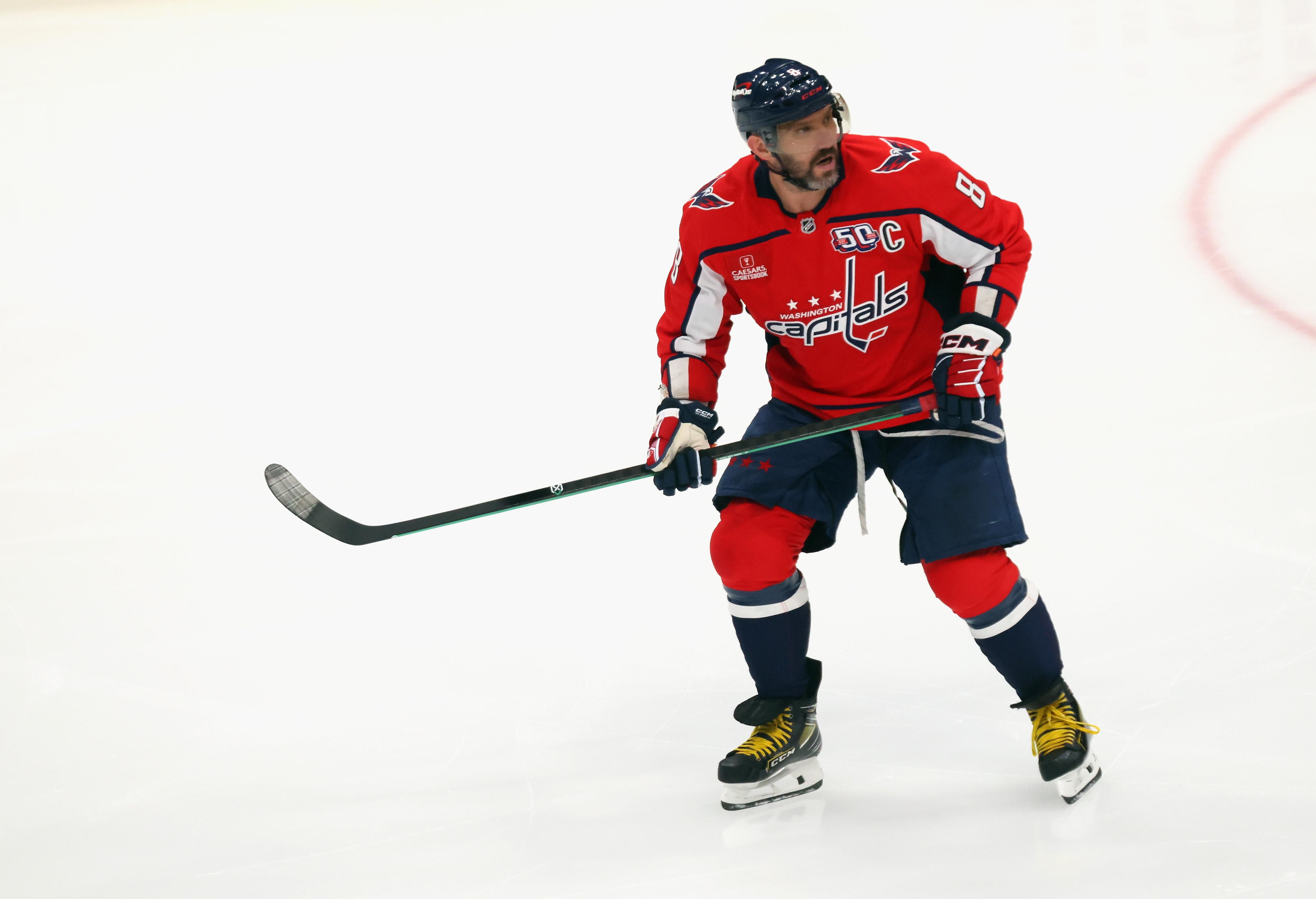 Alex Ovechkin in action on the ice, wearing a #8 Washington Capitals jersey