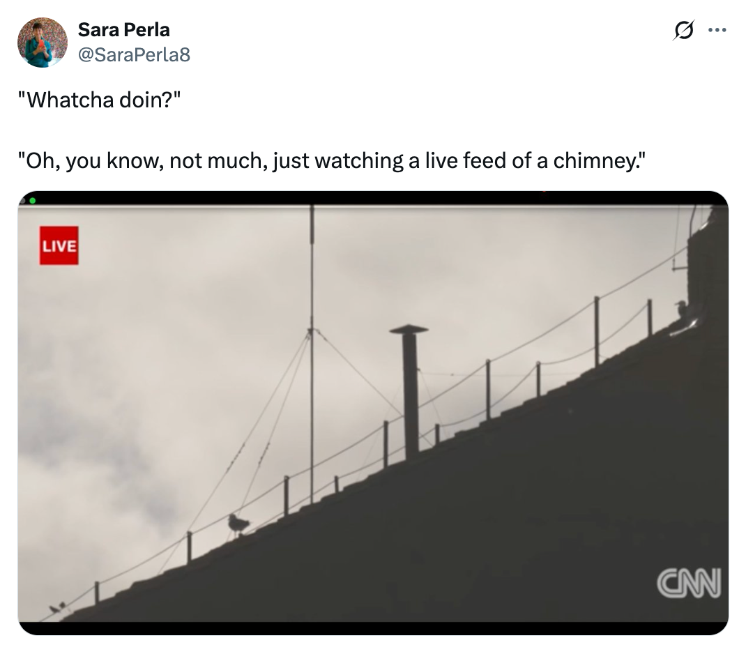 Tweet showing a CNN live feed of a rooftop chimney with comedic text about watching it