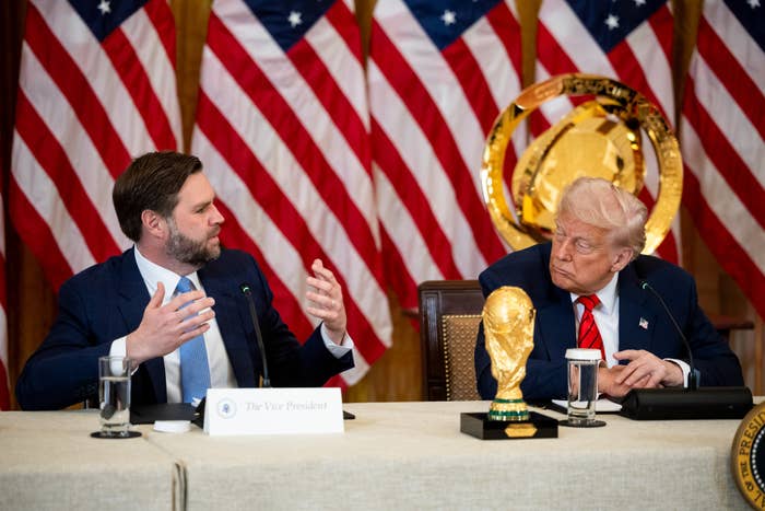 US Vice President JD Vance, left, and President Donald Trump during a FIFA Task Force meeting in the East Room of the White House in Washington