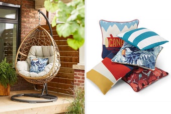 Hanging egg chair with cushions on a porch beside potted plants, set against a brick wall