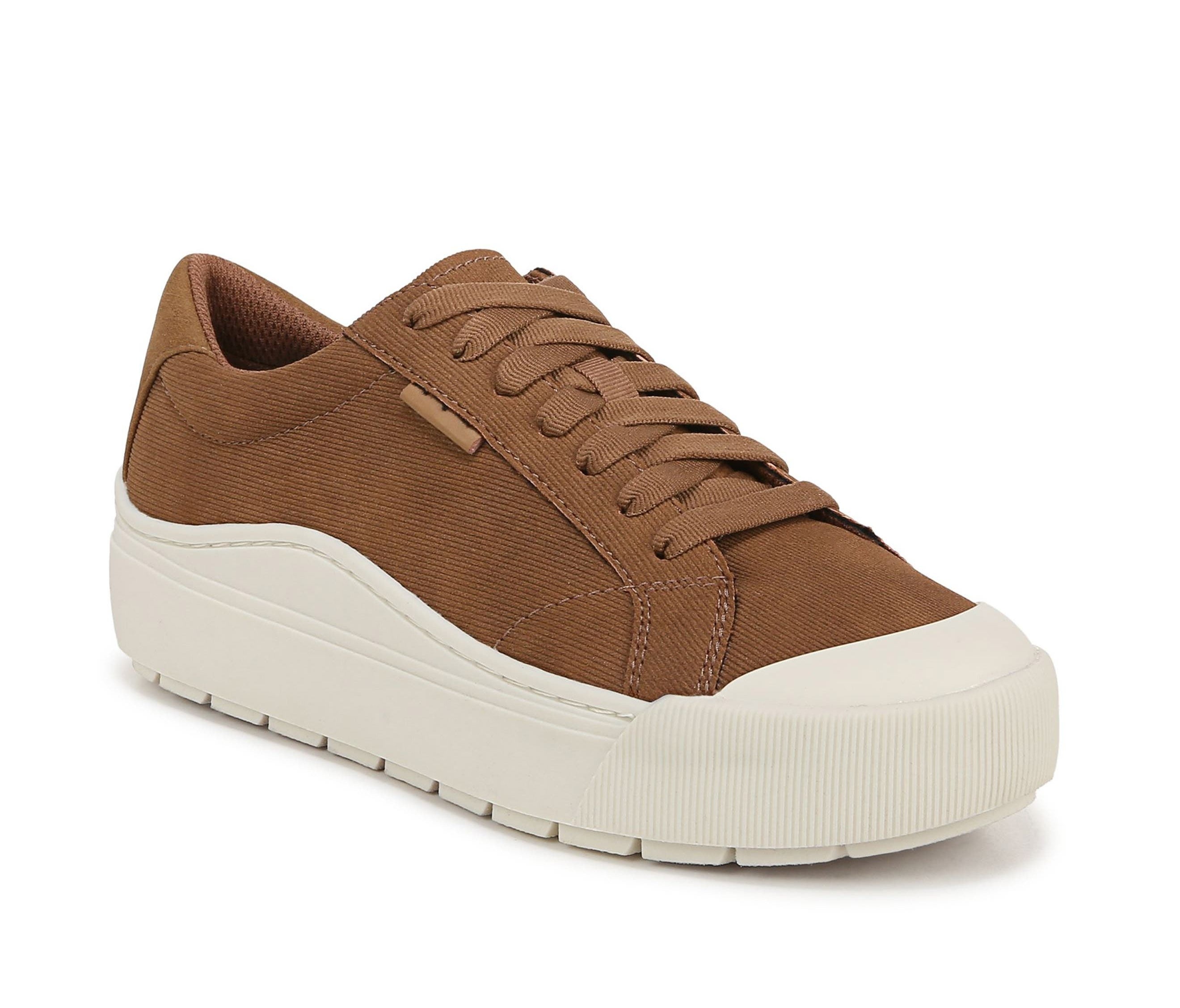 Brown sneaker with white sole, featuring a low-top design and lace-up closure. Perfect for casual outings or everyday wear