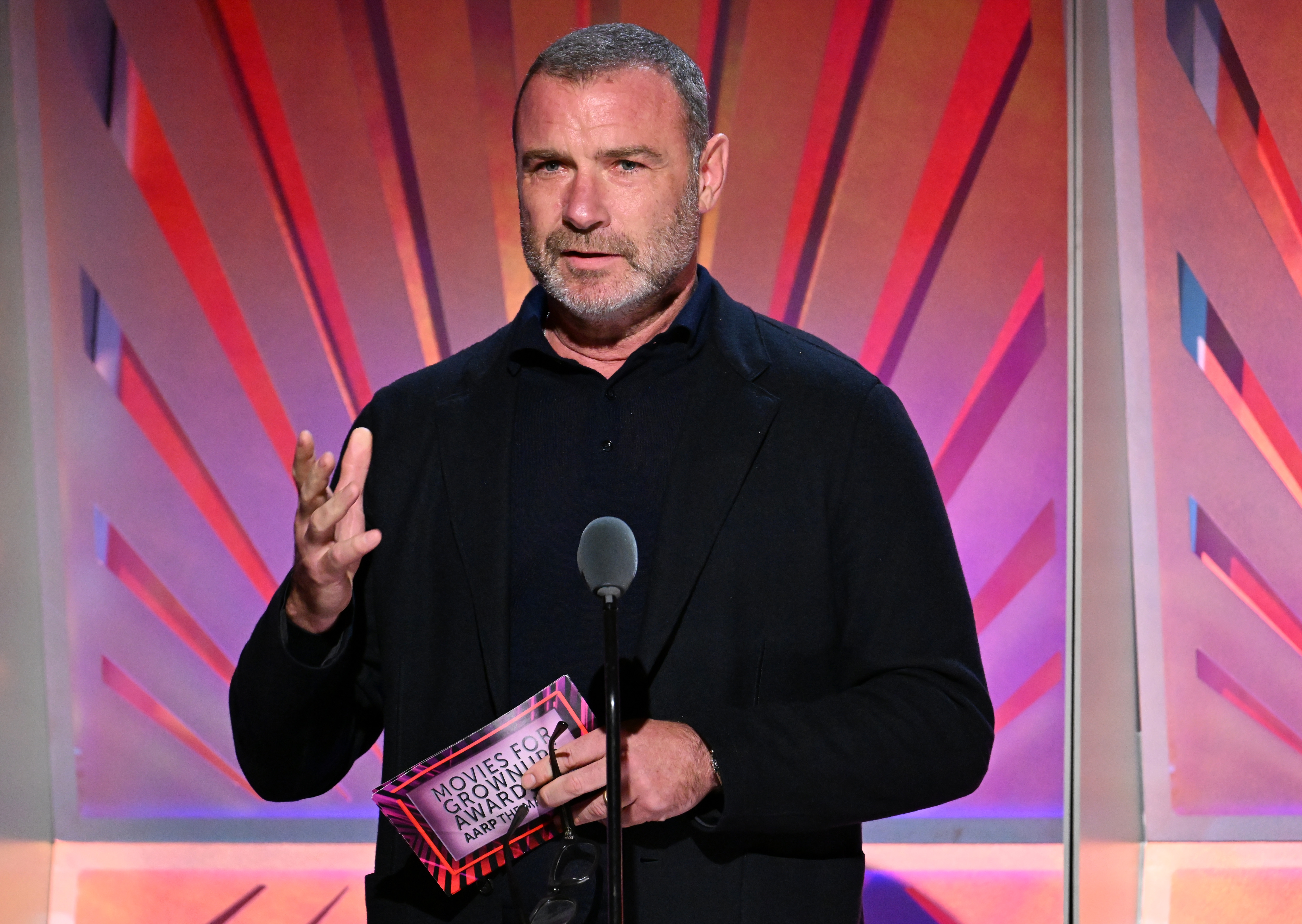 Liev Schreiber speaking at an event