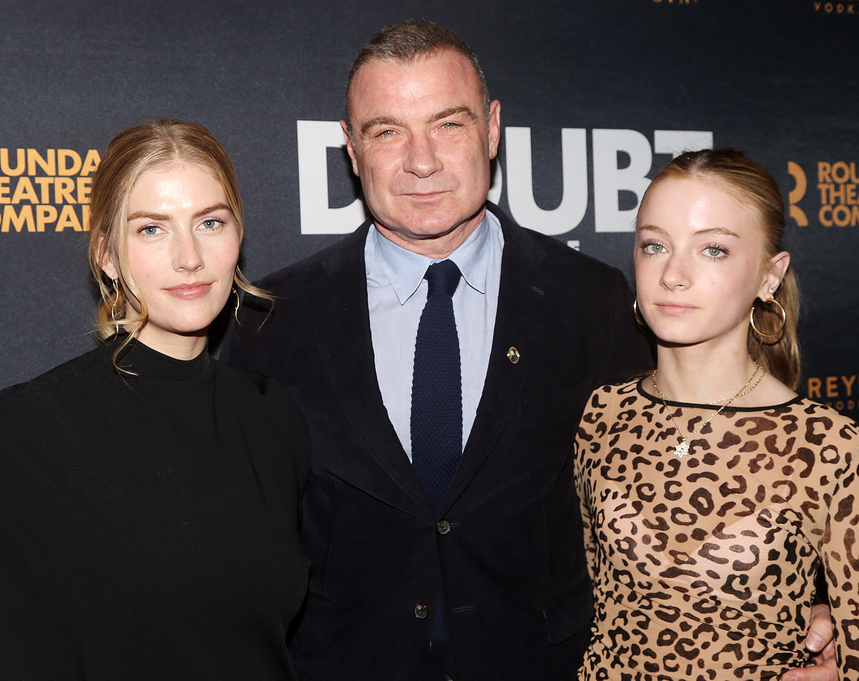Taylor Neisen, Liev Schreiber, and Kai Schreiber at an event