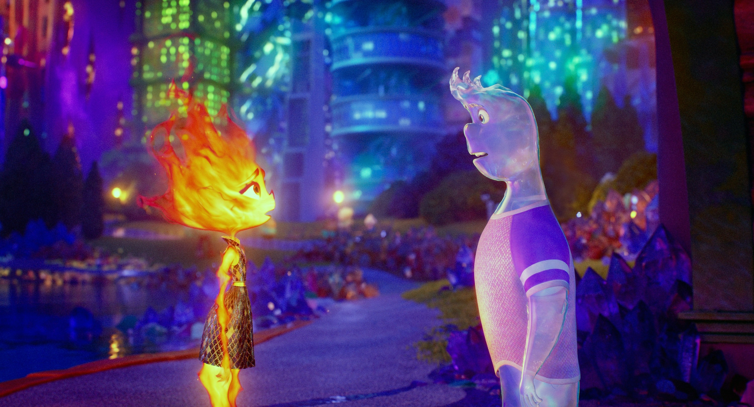 Animated characters Ember, a fire figure, and Wade, a water figure, stand facing each other against a vibrant cityscape in "Elemental."