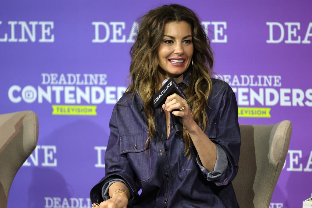 Faith Hill speaks onstage during a panel event