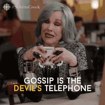 Woman with styled hair holding a cup, text overlay: "Gossip is the devil's telephone." #SchittsCreek tagged