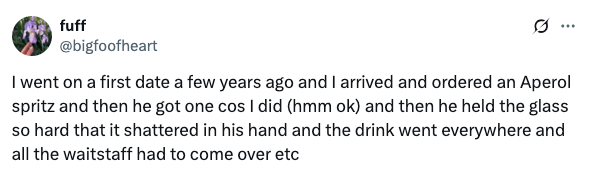 Tweet narrates a first date story: ordering drinks, a glass shattering in hand, and waitstaff helping with cleanup