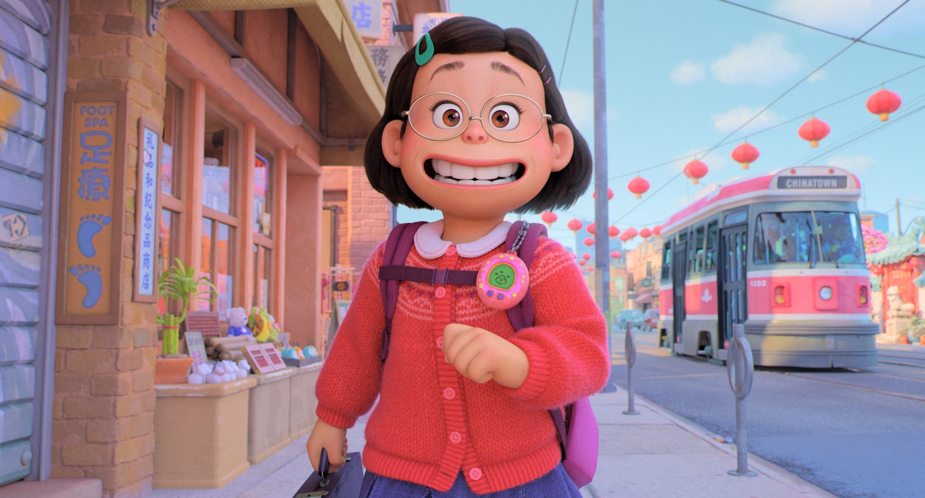 Animated character with glasses and a broad smile walks on a lively city street, holding a bag and wearing a cardigan