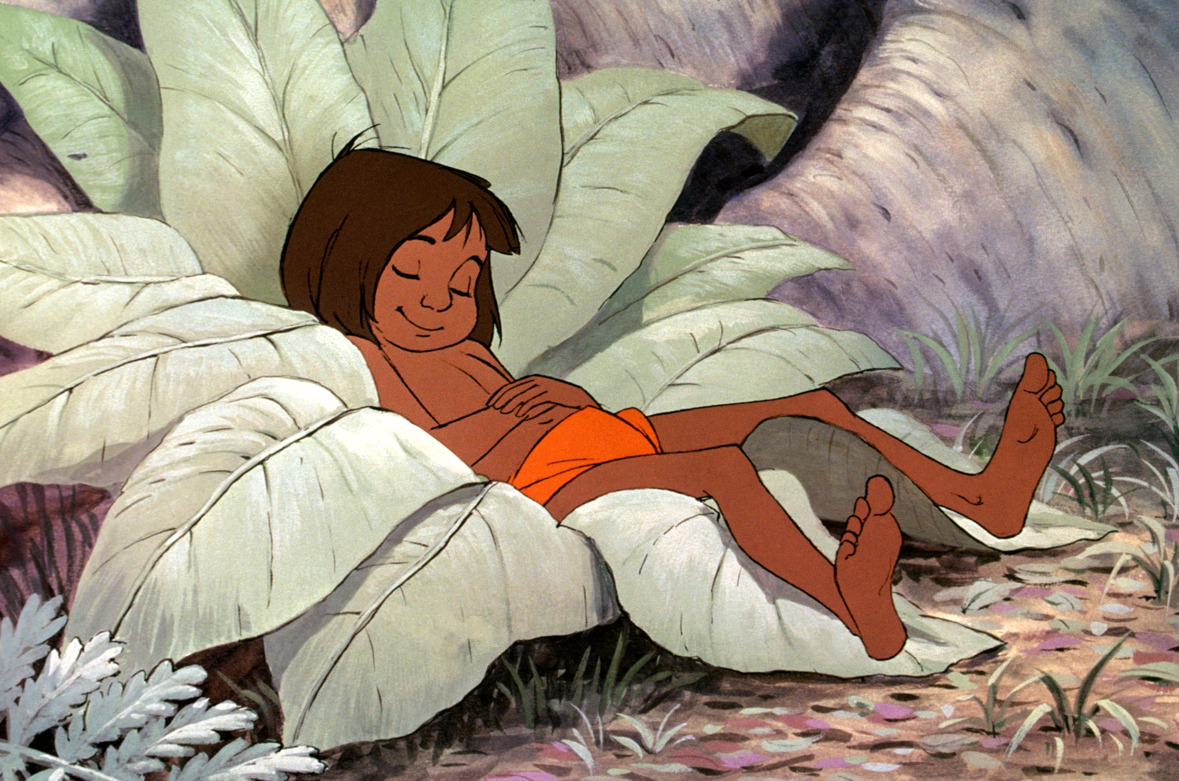 Animated character Mowgli from The Jungle Book peacefully resting on large leaves in the jungle