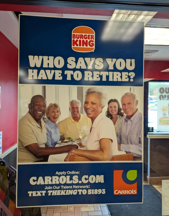Burger King poster reads: "Who says you have to retire?" Features smiling older adults at a table. Encourages job applications at Carrols.com