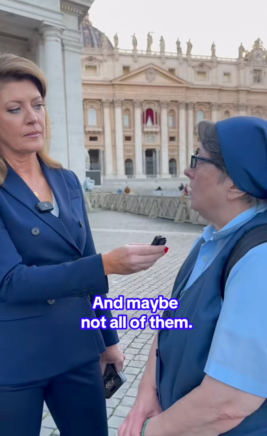 Two individuals having a conversation outside a historic building. A microphone is visible. Text on image reads: "And maybe not all of them."
