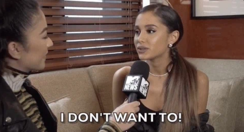 Woman being interviewed on a couch, looking serious, holding a microphone. Text on image reads: "I DON'T WANT TO!"