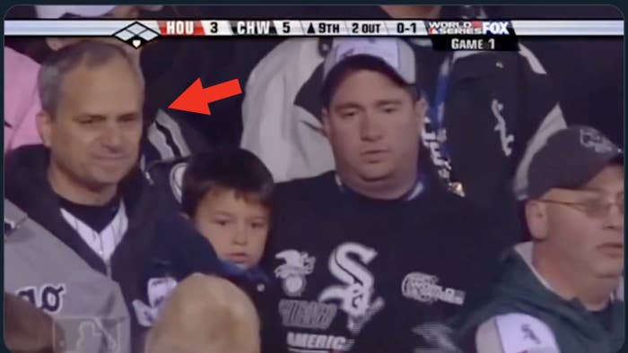 Fans wearing Chicago White Sox gear watch a tense moment during Game 1 of the World Series