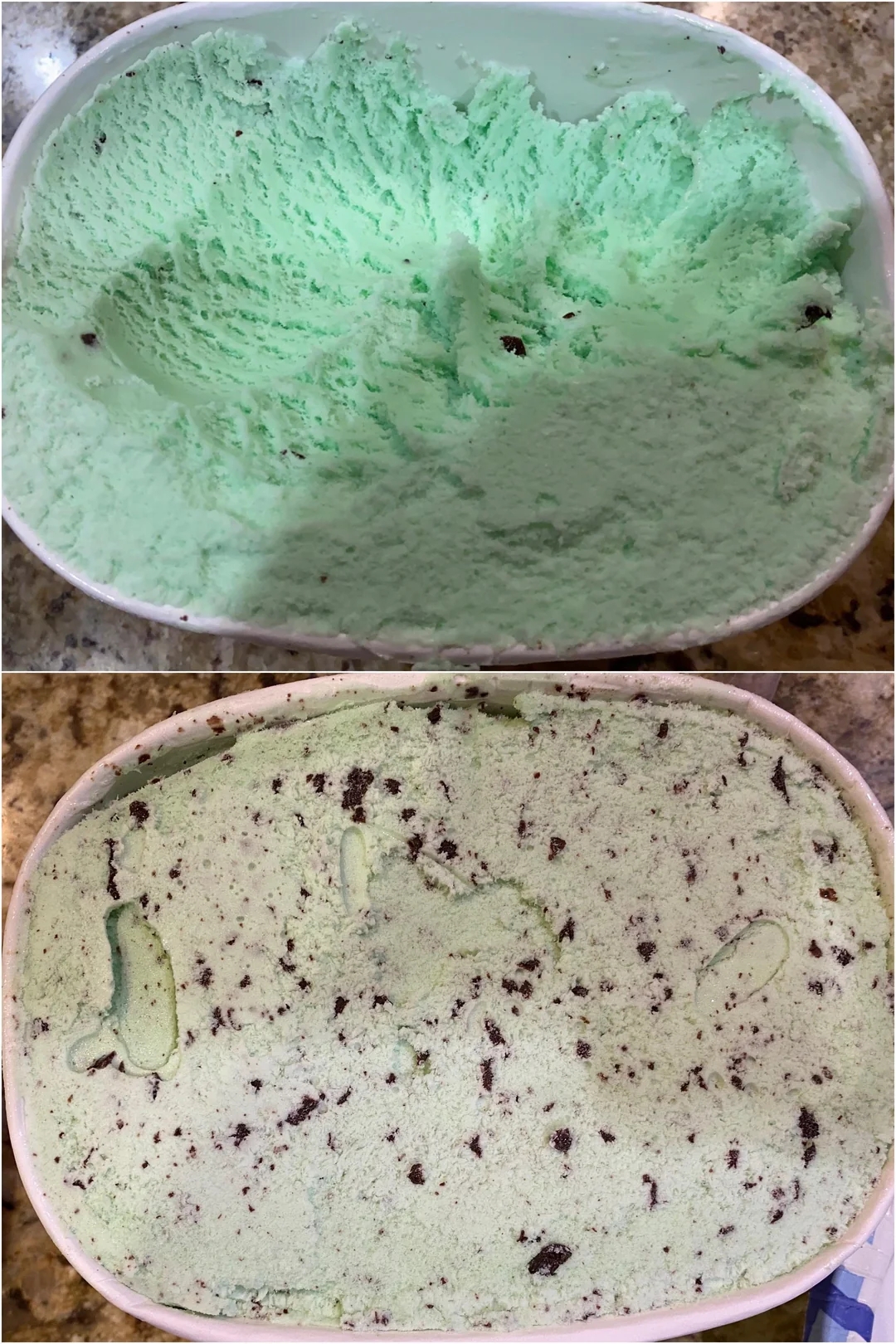 Two tubs of mint chocolate chip ice cream with some scoops missing, sitting on a countertop. The top tub has almost no chips compared to the bottom tub