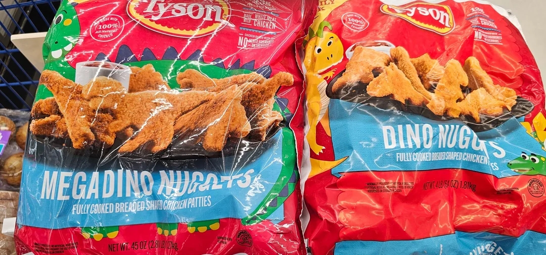 Bags of Tyson Megadino and Dino Nuggets in a store display