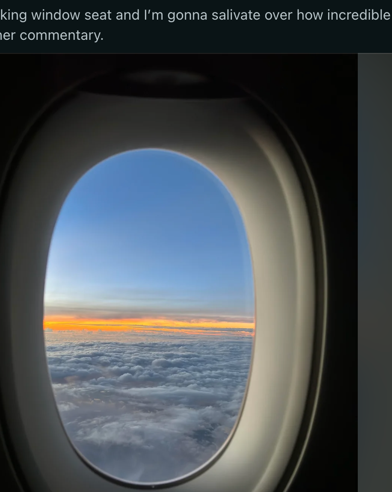 View from an airplane window showing a sunset over clouds, surrounded by a Reddit interface about complimentary eye masks