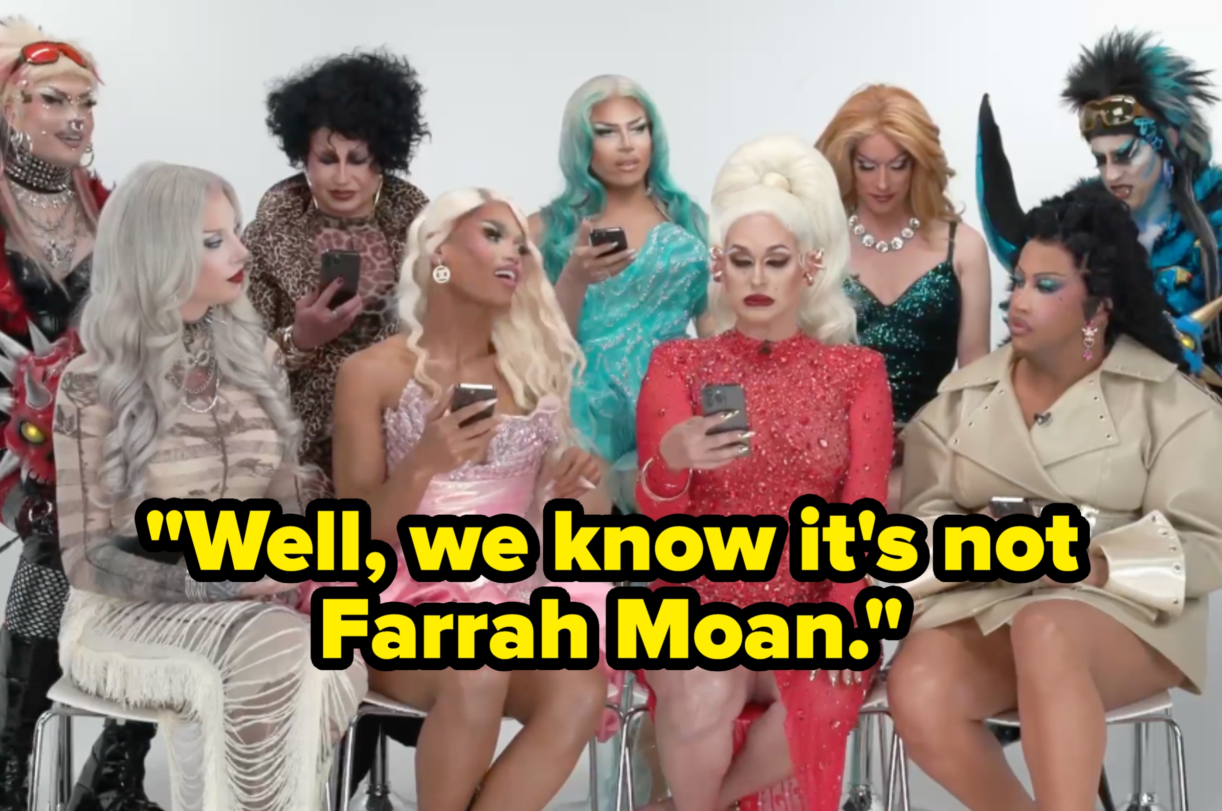 A group of drag performers sit together, looking at their phones. Text overlay humorously reads, "Well, we know it's not Farrah Moan."