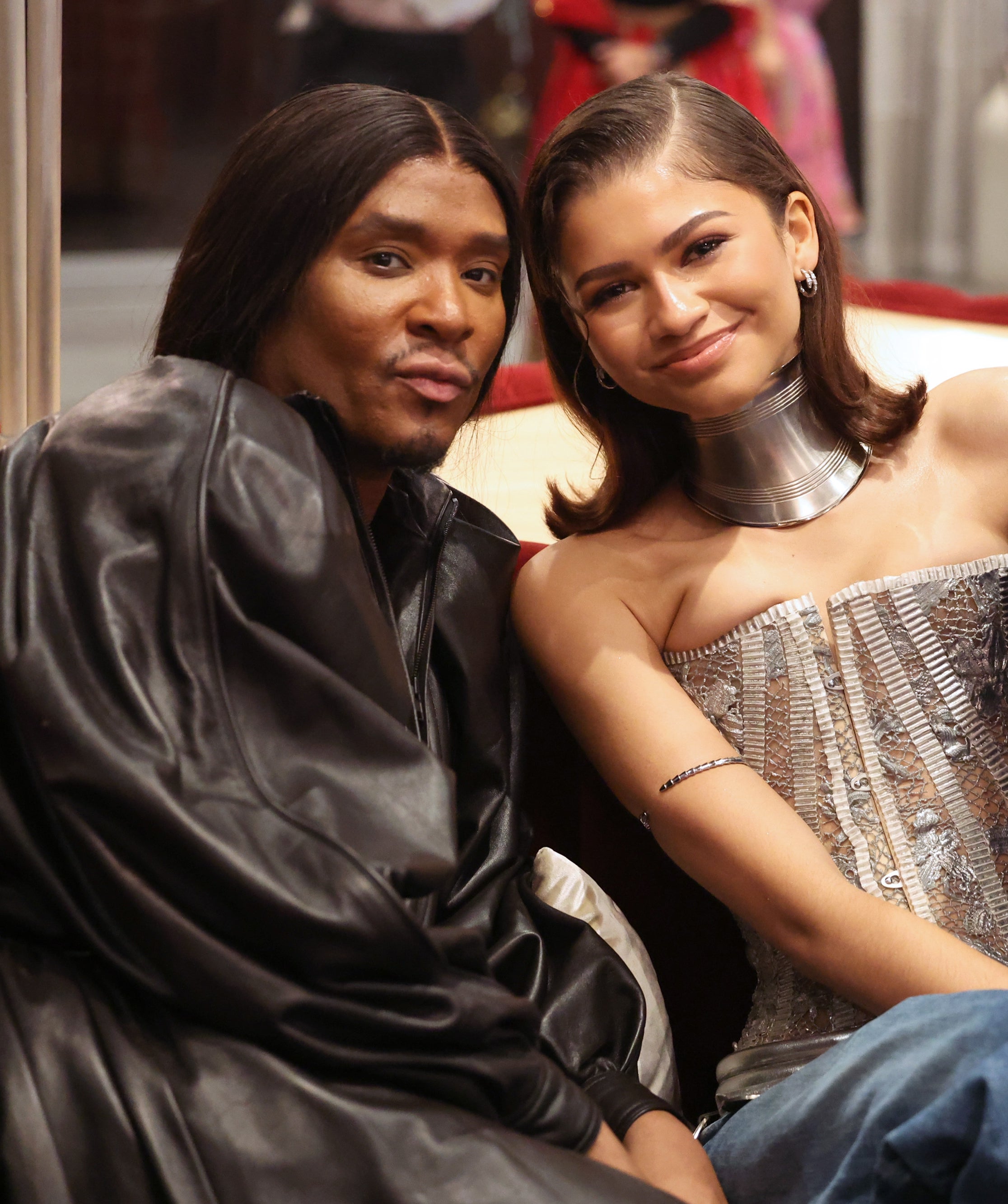 Law Roach and Zendaya posing together at an event