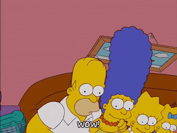 Cartoon family on a couch reacts with surprise; caption reads &quot;WOW!&quot;