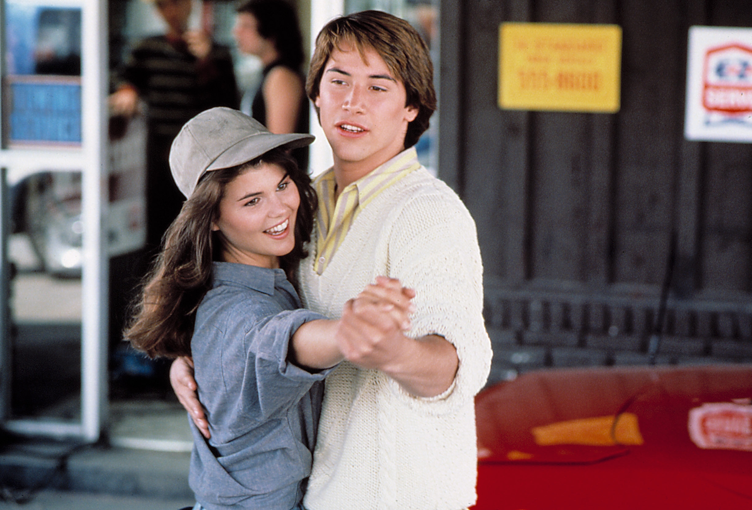 Lori Laughlin and Keanu Reeves in "Brotherhood of Justice."