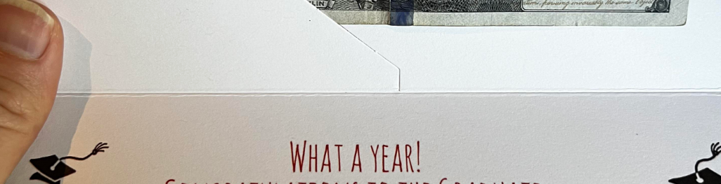 Graduation card with a humorous note about inflation from Dad and a congratulatory message from Mom to their graduate. $100 bill included