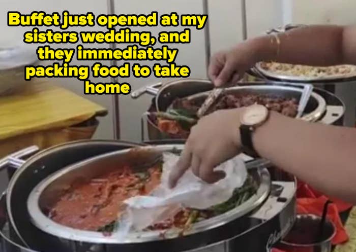 Person taking food from a buffet, captioned "Buffet just opened at my sisters wedding, and they immediately packing food to take home"