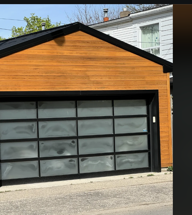 Screenshot of a Reddit post showing a garage with privacy glass issues. The garage door glass turns foggy in bad weather, according to the post's text