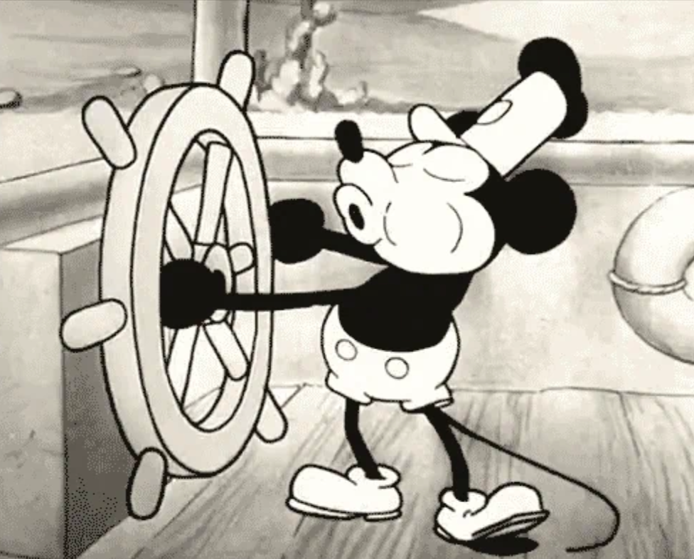 Cartoon mouse in vintage sailor attire joyfully steering a large ship wheel, evoking classic animation style
