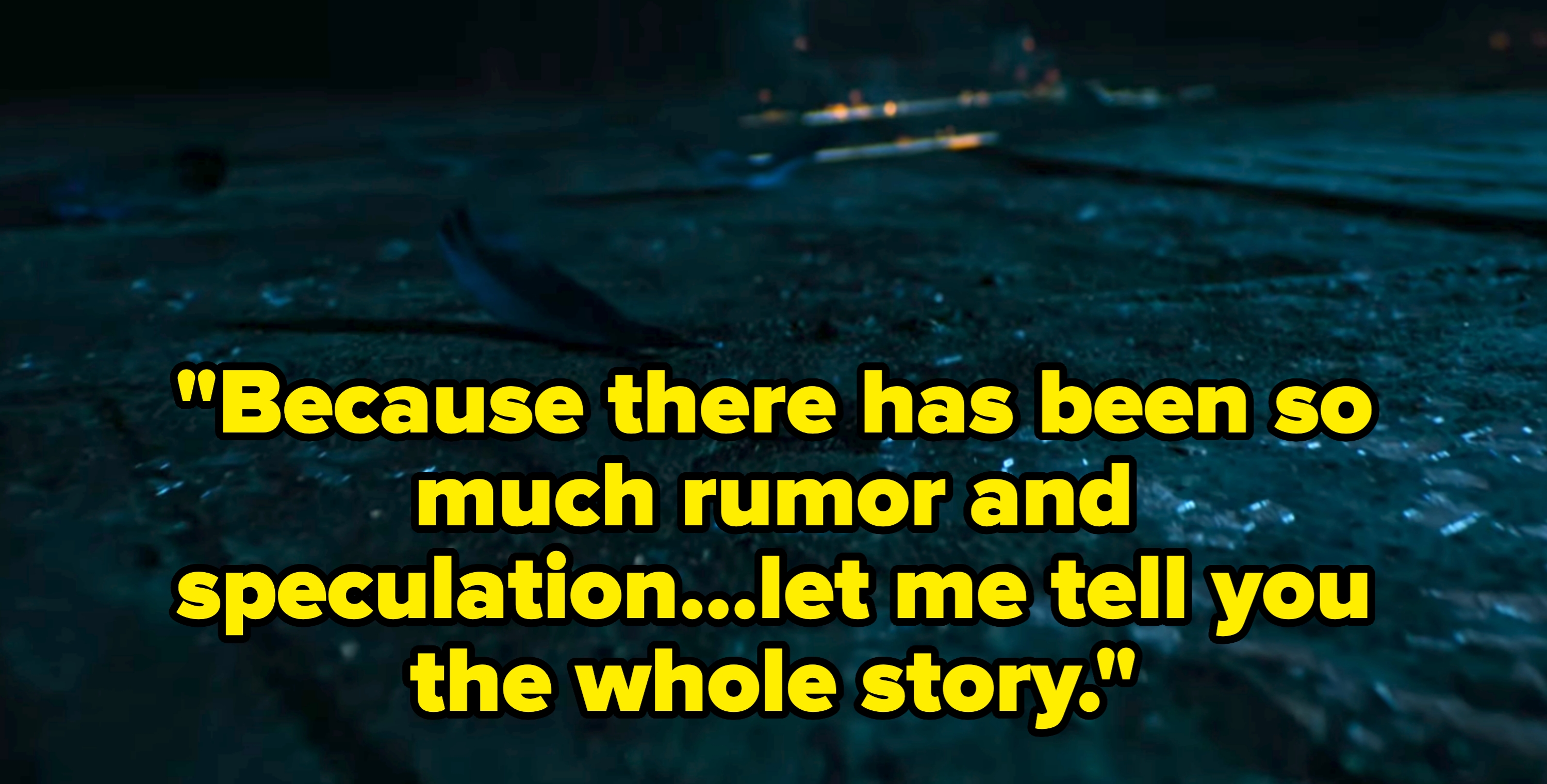 Close-up of a dimly lit floor scattered with glass shards and a feather