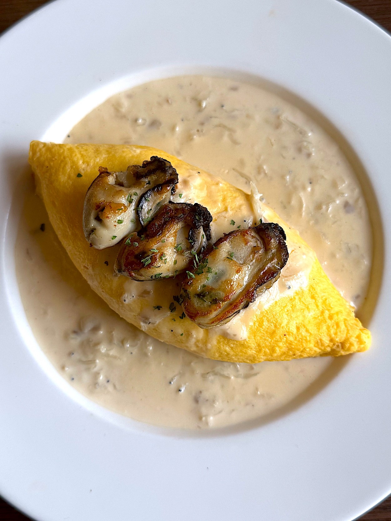 ロイヤルホストの「牡蠣のバター焼き添え ちいさなクリームオムライス スペシャルランチ」