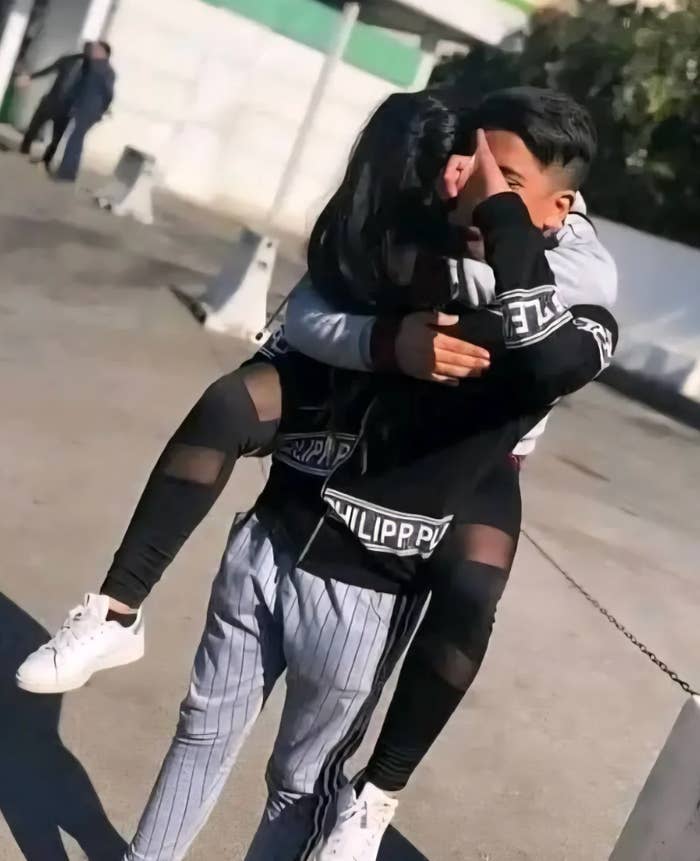 Person piggybacks different  successful  an outdoor setting, sharing a joyful moment. Both deterioration  casual, sporty attire