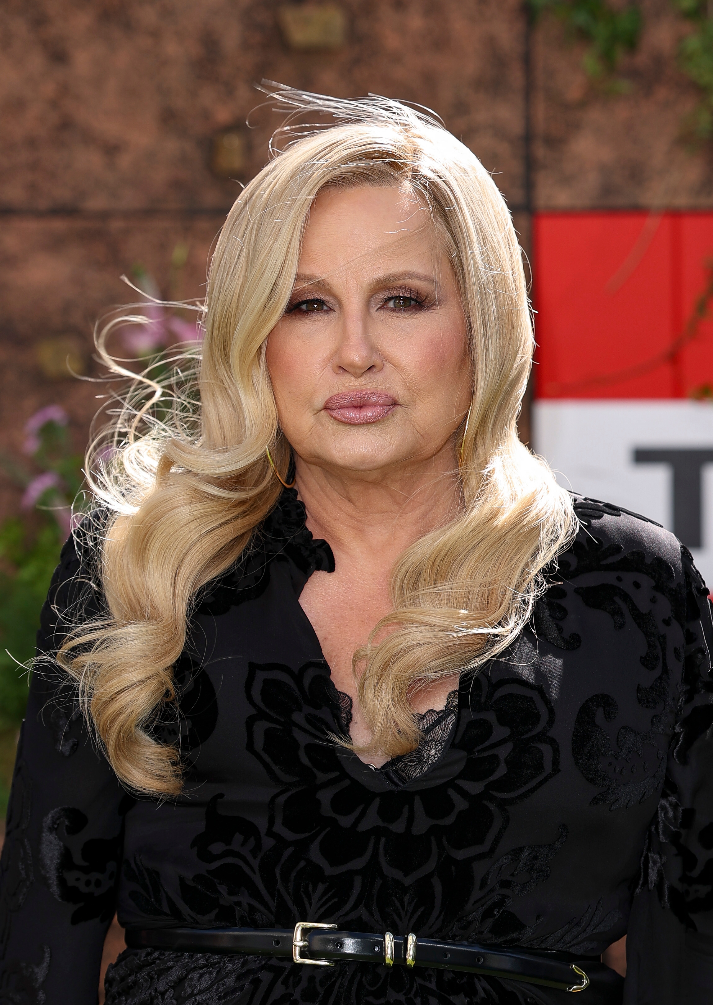 Jennifer Coolidge posing outdoors