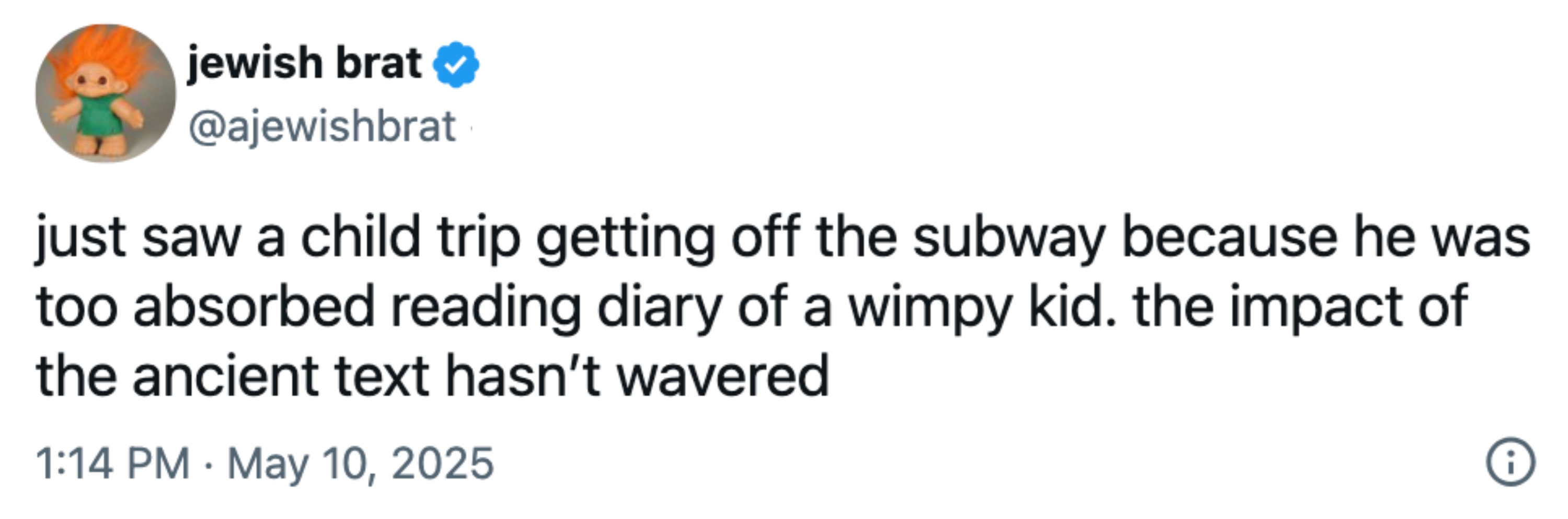 Tweet about seeing a child trip while reading "Diary of a Wimpy Kid" on the subway, humorously noting the book's lasting impact