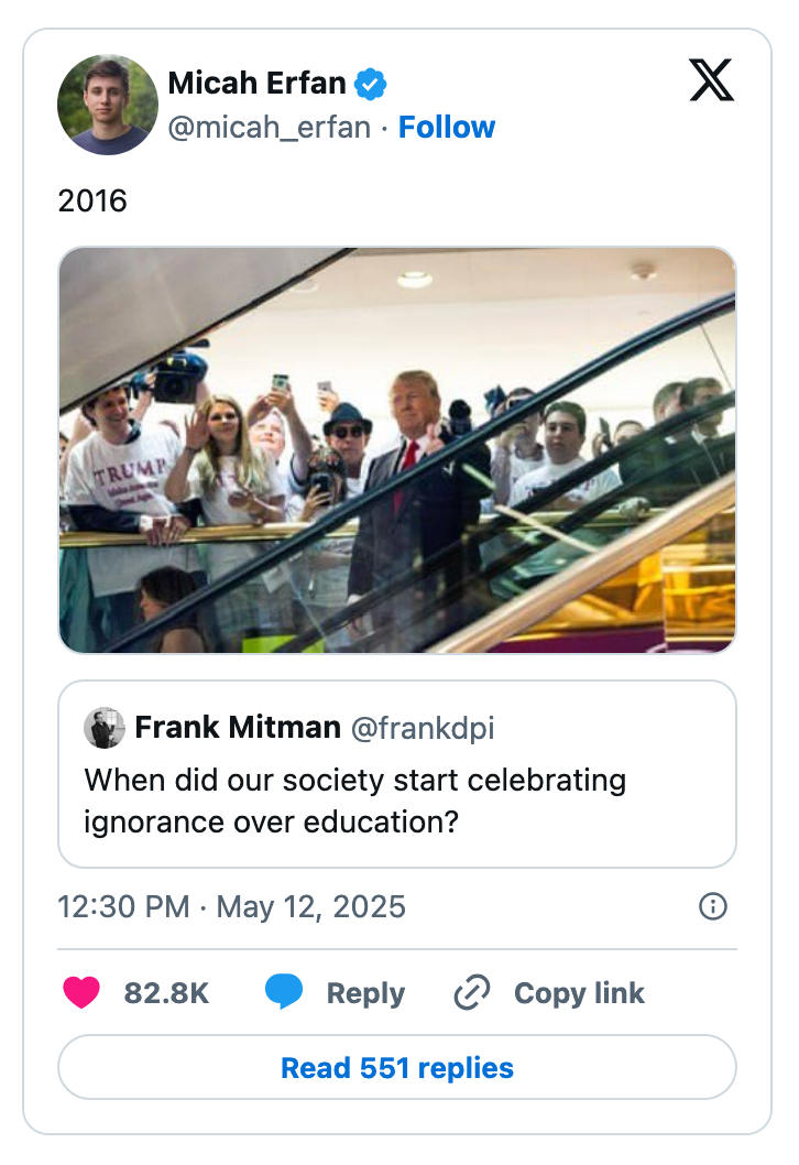 A person on an escalator surrounded by people taking photos with cell phones. Text below asks, "When did our society start celebrating ignorance over education?"