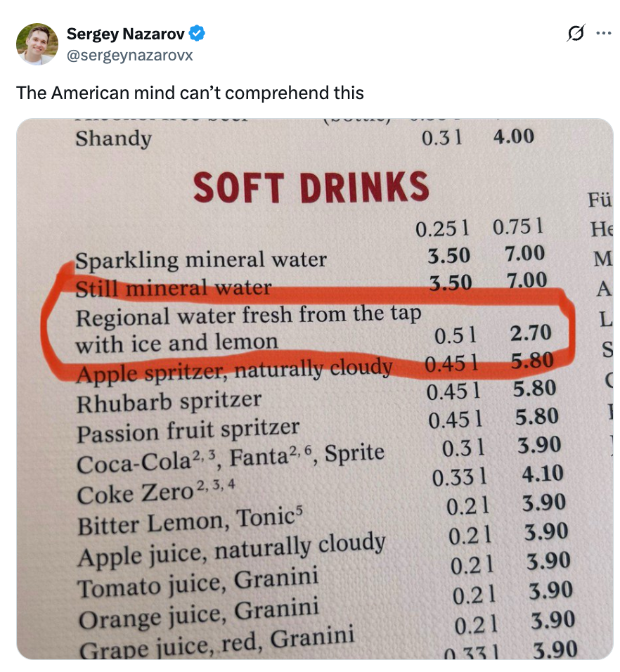 Soft drinks menu highlighted with "Regional water fresh from the tap with ice and lemon" priced higher than bottled water options