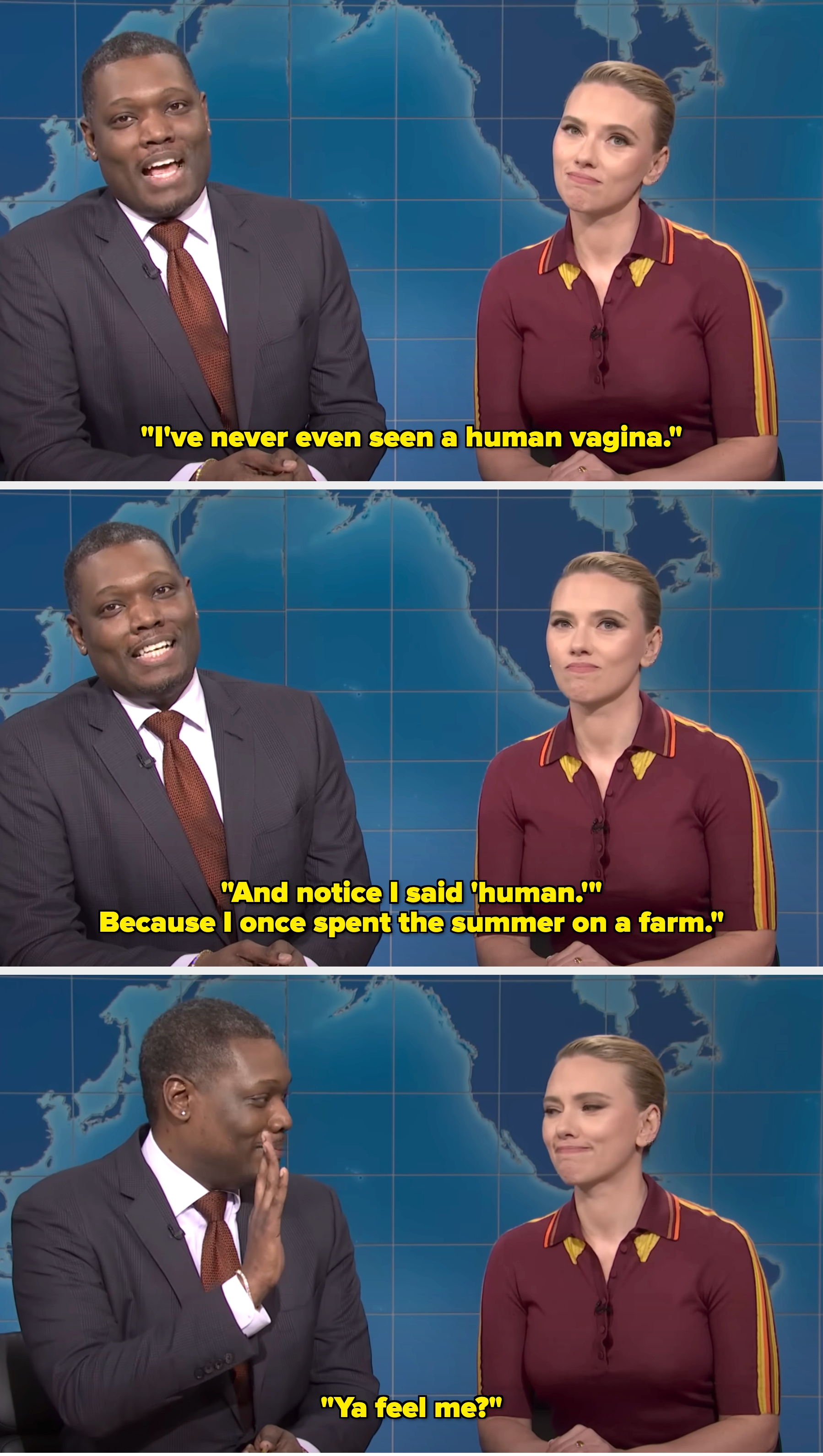 Two people sit at a news desk on a comedy show set. The man wears a suit and tie; the woman wears a collared dress with stripes on the sleeves