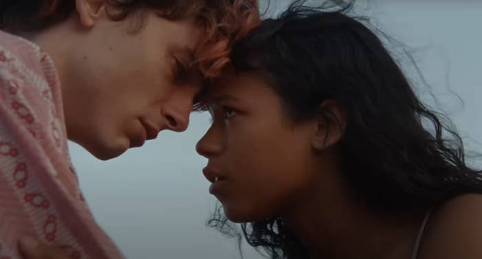 Timothée Chalamet and Taylor Russell put their heads together in a scene from &quot;Bones and All&quot;