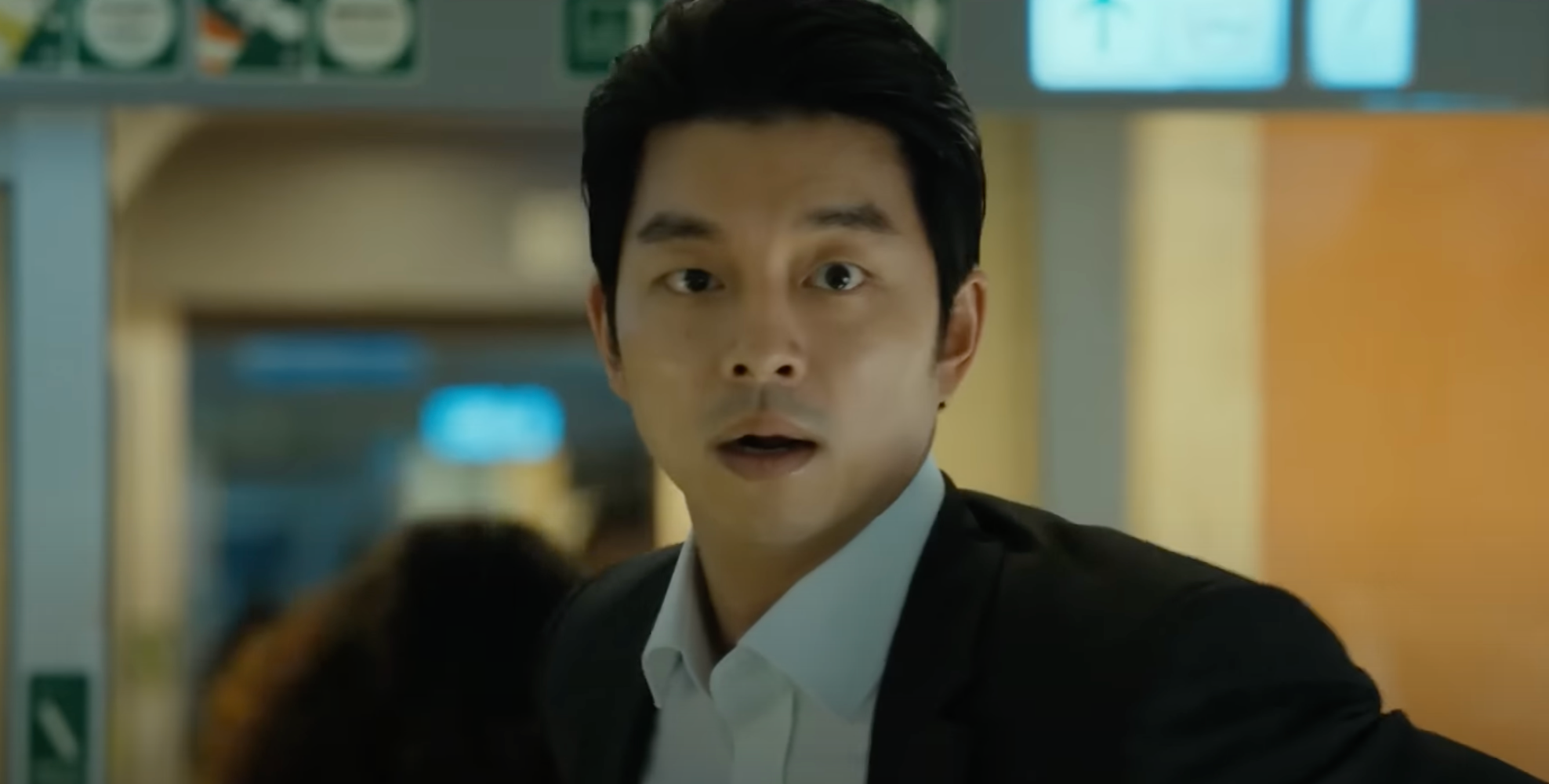 Close-up on Gong Yoo on a train with a surprised expression in &quot;Train to Busan&quot;